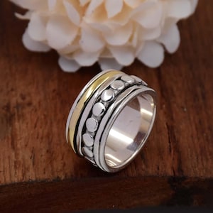 Spinnerring i sterlingsilver: Tvåfärgad pärlbesatt ångestring