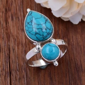 Turquoise peerring: handgemaakte sterlingzilveren statementring
