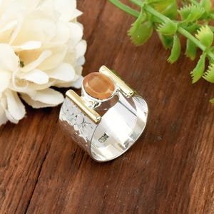 Oval Peach Moonstone Ring: Textured Sterling Silver Wide Band