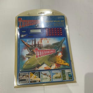 Thunderbird computer mouse mat, with calculator and clock, Brand New still in original package.