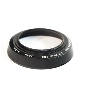Rare genuine Minolta Lens Hood for Minolta 28mm wide angle lenses 49mm diameter