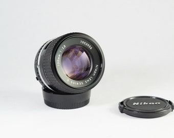 Nikon 100 f2.8 E series Lens w/ Front & Rear Caps