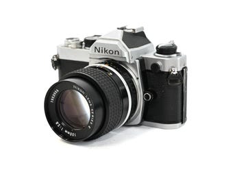 Nikon FM 35mm film camera kit with 100mm ais lens