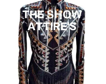 May include: Black show jacket with intricate beadwork and fringe. The jacket features a high collar and long sleeves. The text "THE SHOW ATTIRE'S" is displayed across the front of the jacket.