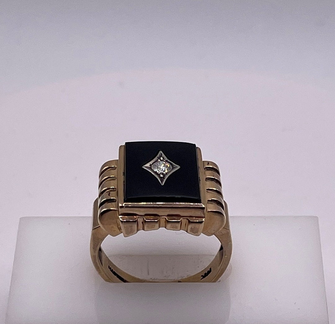 Mens Onyx Fashion Ring With Diamond Center Stone Set in 10K Yellow Gold