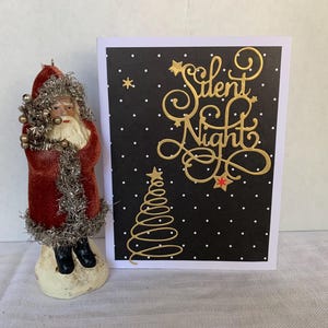 Stille nacht gestanste handgemaakte kerstkaart.  5" x 7" - blanco binnenkant en geleverd met envelop.