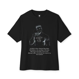 May include: Black t-shirt with a white graphic of a man holding a coffee cup. The text on the shirt says "Muscles are Made". Below the graphic is text that reads "Life Hack 47: Buy 2 Identical Sugar Bowls... You're welcome!"