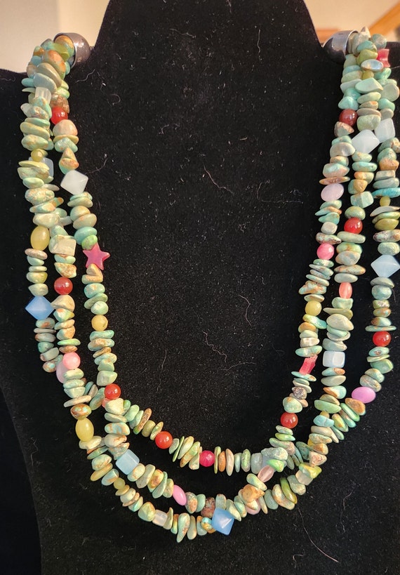 Turquoise 3-strand chunky necklace.