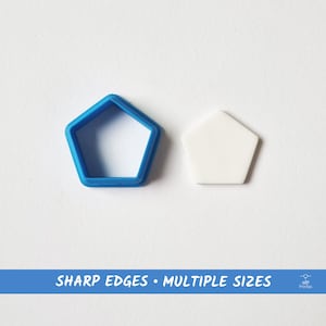 May include: A blue plastic five-pointed star cookie cutter and a white plastic five-pointed star.  "SHARP EDGES - MULTIPLE SIZES" is printed in blue on a white background.