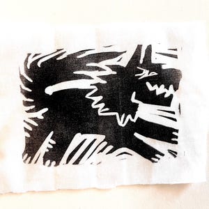 Running wolf patch sew or glue on