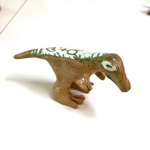 Trans Dino trex sculpture handmade ceramic pottery