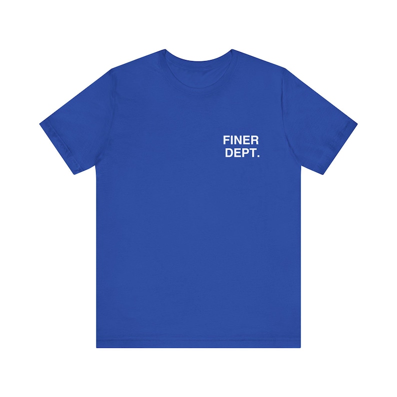 May include: Royal blue t-shirt with the text "FINER DEPT." printed in white on the upper left chest area. The shirt has short sleeves and a crew neck.