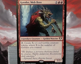 May include: A Krenko, Mob Boss trading card featuring a green-skinned goblin warrior in a red cloak holding a blade. The card text includes the name, mana cost, creature type, ability text, flavor text, and a 3/3 power and toughness rating.