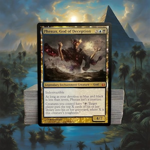 May include: A collectible trading card featuring "Phenax, God of Deception." The card has a black border with gold accents and depicts a spectral figure with outstretched arms. The background shows a pyramid and palm trees. The card's power and toughness are 4/7.