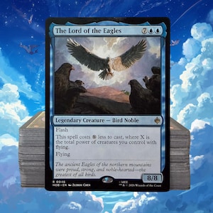 May include: A Magic: The Gathering trading card titled The Lord of the Eagles, featuring a large eagle in flight above other eagles in a mountain landscape. The card is a blue Legendary Creature - Bird Noble with 8/8 power and toughness stats.