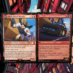 May include: Two Magic: The Gathering trading cards featuring Slicer, Hired Muscle and Slicer, High-Speed Antagonist. The left card shows a robot character, while the right card depicts a black sports car. Both cards feature red borders and text.