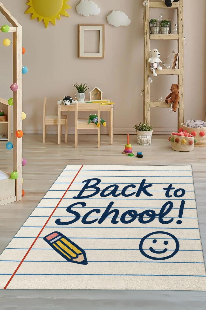 Thin lightweight rug with back-to-school theme, styled in a kid’s bedroom with colorful furniture.