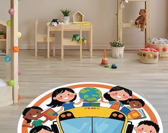 May include: A round rug featuring a yellow school bus with children and a globe. The rug has an orange border and is designed for a child's room. The children are holding books and smiling. The rug is placed on a light wood floor.