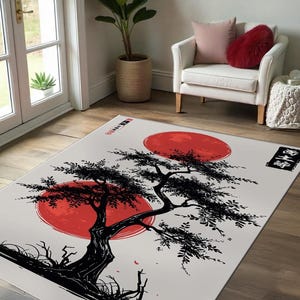 Inspired by Japanese Sumi-e ink art, this stunning Zen-inspired rug brings the beauty of traditional Japanese culture into your home. Featuring a bold red sun (Hinomaru), a graceful bonsai tree, and elegant brushwork, this rug reflects harmony, balance, and simplicity—the essence of Zen aesthetics.