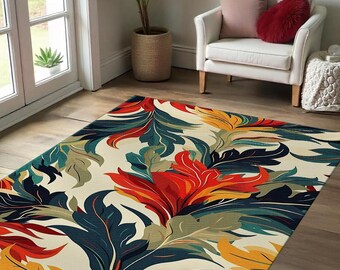 May include: A rectangular area rug with a vibrant floral pattern. The rug features large, stylized leaves and flowers in shades of red, orange, yellow, teal, and navy blue against a cream background. The rug is placed on a wooden floor.