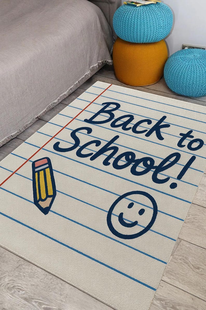 White rug with blue and red notebook lines, “Back to School” text, and doodle graphics.