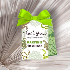 May include: Green and brown snake themed thank you tag with the text "Thank You! For Slithering on Over MAXTIN'S 4TH BIRTHDAY".