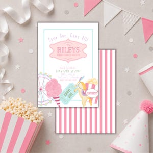 May include: A circus-themed invitation with a pink and blue color scheme. The invitation features text that reads "Come One, Come All!" and "Riley's Three Ring Circus." The design includes illustrations of a Ferris wheel, cotton candy, popcorn, and a ticket.