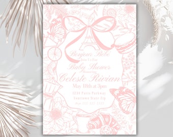 Puede incluir: Una invitación de baby shower rosa y blanca con un tema parisino. La invitación presenta un dibujo de la Torre Eiffel con un lazo rosa, una bicicleta, una mariposa y una taza de café. El texto de la invitación dice: "Bonjour Bébé, Join Us For Baby Shower Honoring Celeste Rivian, May 18th at 3pm, 1234 Paris Parkway, Yourtown State Zip, Mage 555-555-5559."