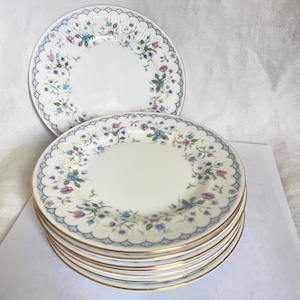 Juego de cuatro platos auxiliares Paragon Horabella: platos florales vintage, platos para el pan, platos de postre