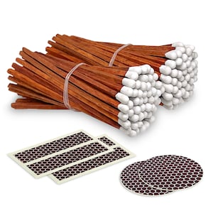 May include: Two bundles of long, brown wooden matches with white tips, along with two sheets of brown strike-anywhere match paper and two round strike-anywhere match pads.