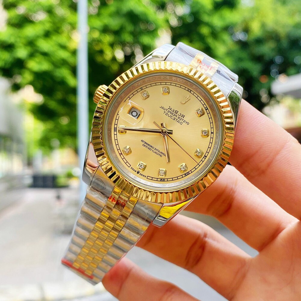 Rolex Datejust 31mm Steel Case Champagne Diamond Dial Yellow Gold Fluted  Bezel Steel and Gold Jubilee Bracelet Automatic Watch 178273