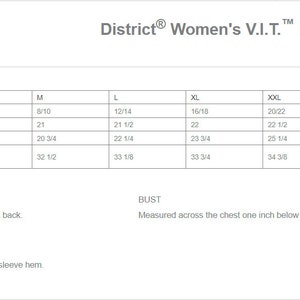 May include: A white product measurement chart for a District Women's V.I.T. Fleece Hoodie DT6101. The chart includes sizes XS to 4XL, with measurements for body length at back, bust, and sleeve length from center back in inches.