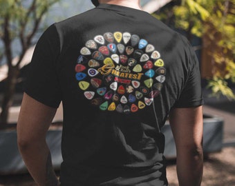 May include: Black t-shirt with a circular design of colorful guitar picks. The design features the text "Rock & Roll's Greatest Picks".