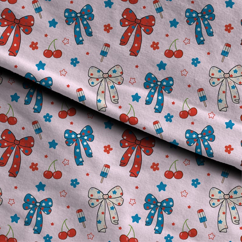 May include: A light pink fabric with a repeating pattern of red, white, and blue bows, stars, flowers, cherries, and popsicles. The bows have star accents, and the popsicles are red, white, and blue.