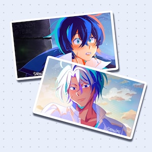 May include: Two anime-style art prints featuring male characters with blue and white hair. One print shows a character with a worried expression, while the other has a smiling character. The prints have the text "DO NOT STEAL" and the artist's name.