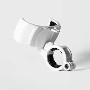 A professionally shot GO Plus + compatible handlebar mount, rugged edition, in gloss white. This angled product shot on a white background highlights the curved snap-fit cradle and the secure circular clamp at the base. The durable mounting accessory is designed to hold a circular mobile gaming auto-catcher on handlebars for bikes, scooters, and strollers, providing a stable, hands-free solution for active players.
