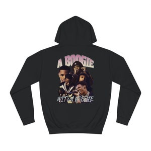 May include: Black hoodie with a graphic of several people and the text "A Boogie Wit Da Hoodie" in a retro style. The hoodie has a drawstring hood and long sleeves.