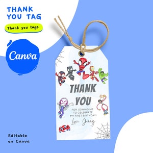May include: A white thank you tag with a blue watercolour background and a spiderweb design. The tag features cartoon images of Spiderman, Iron Man, Hulk, and other superheroes. The text on the tag reads "Thank You" and "For joining me to celebrate my first birthday! Love, Jenny".