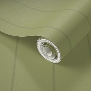 May include: A roll of green wallpaper with a subtle striped pattern. The wallpaper is rolled up and the end of the roll is visible.