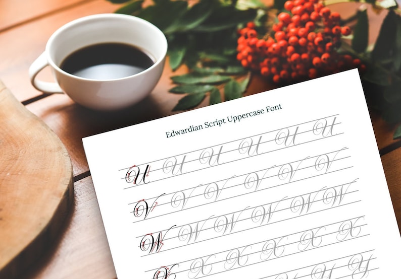 May include: A worksheet for practising cursive handwriting in the Edwardian Script Uppercase Font. The letters U, V, W, X, and Y are shown in cursive script on lined paper.