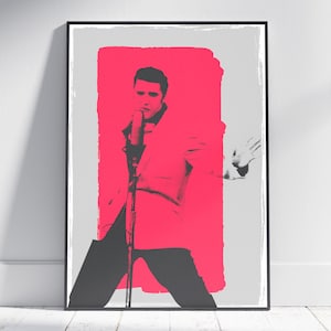 May include: A black and white image of a man singing into a microphone. The man is wearing a suit and is standing in front of a bright pink background.