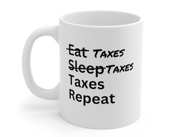 May include: White ceramic coffee mug with black text that reads "Eat Taxes Sleep Taxes Taxes Repeat".