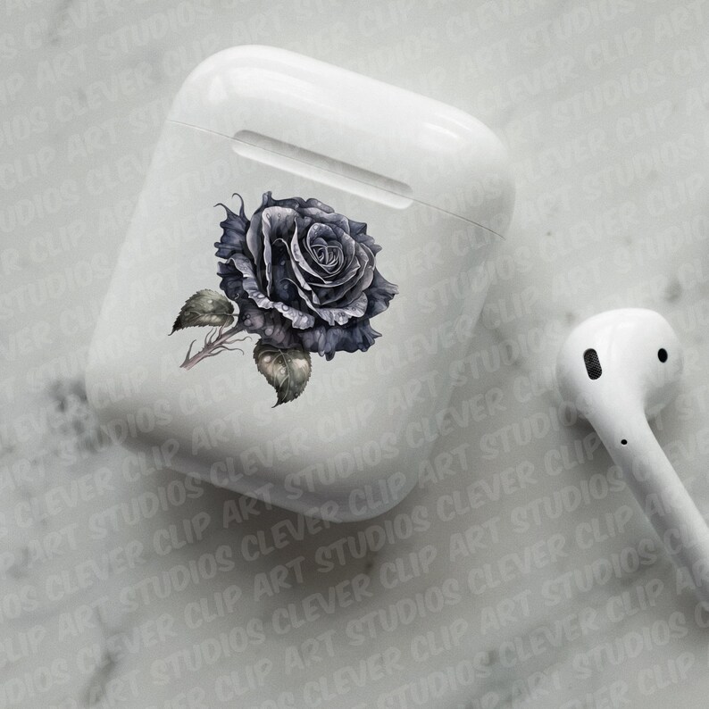 May include: A white AirPod case with a black rose design. The rose is drawn in a realistic style with a dark gray stem and leaves.