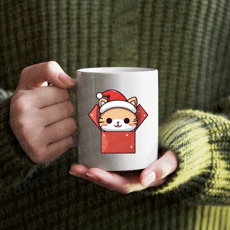 May include: White ceramic mug with a red and white illustration of a cat wearing a Santa hat peeking out of a red gift box.