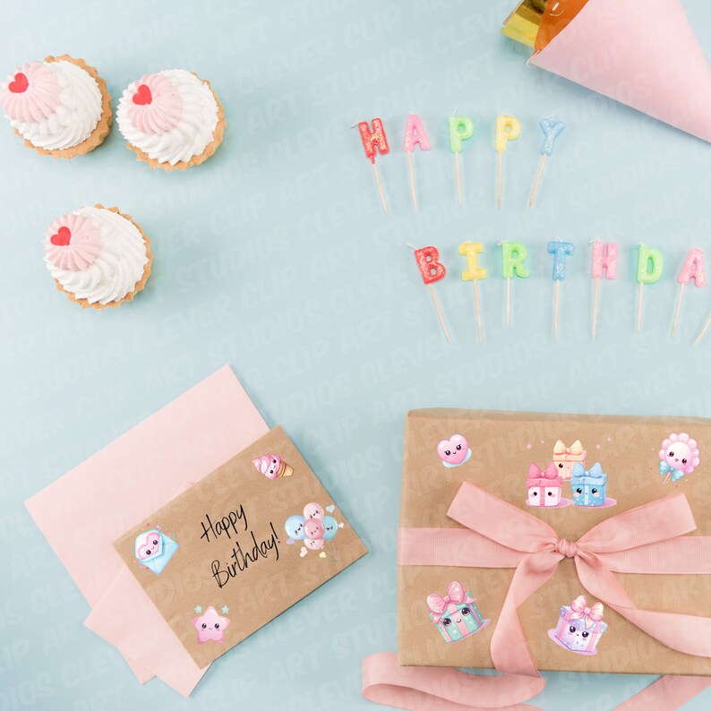 May include: A brown gift box with a pink ribbon and cute cartoon stickers. The box is surrounded by pink and white cupcakes, colourful candles that spell "Happy Birthday", and a pink and white card that says "Happy Birthday!"