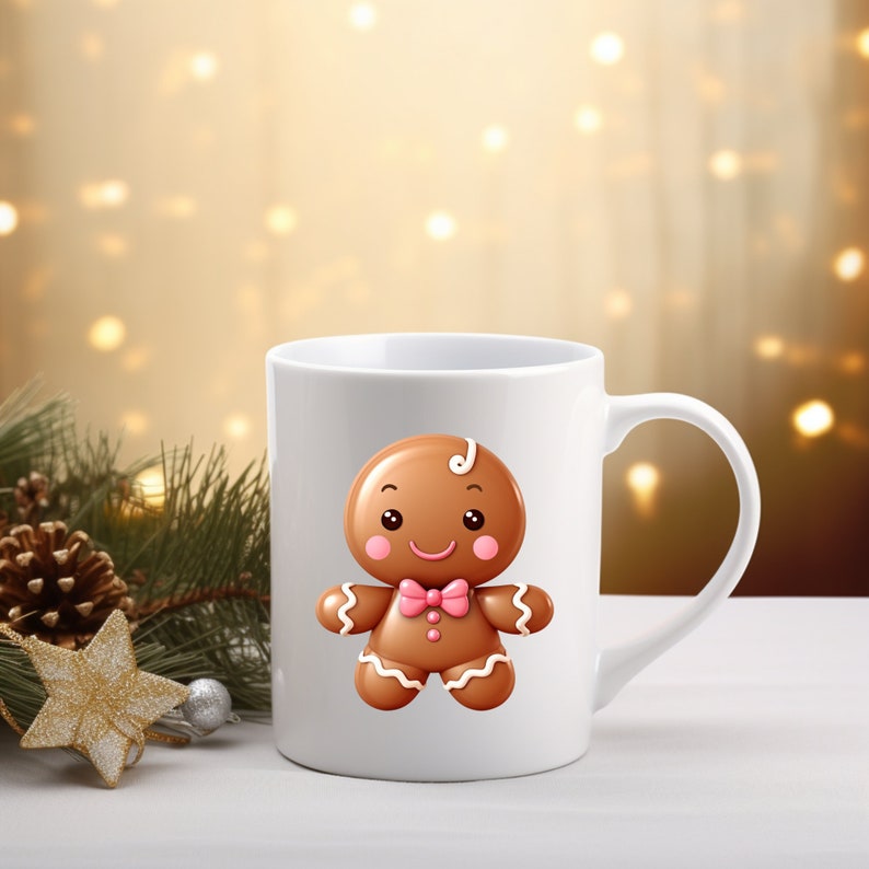 May include: White ceramic mug with a gingerbread person design. The gingerbread person is brown with white icing and a pink bow tie. The mug has a brown handle.