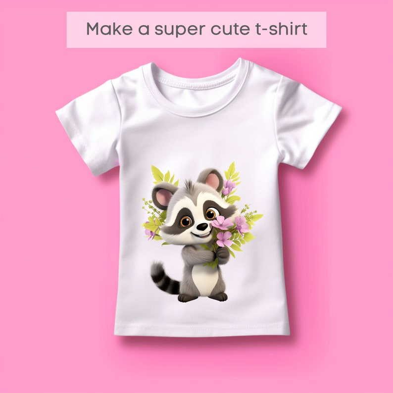 May include: White t-shirt featuring a cartoon raccoon holding a bouquet of pink flowers and green leaves. The raccoon has gray and white fur with a black striped tail. Text above the shirt reads "Make a super cute t-shirt".