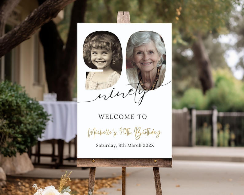 May include: White welcome sign with a photo of two women in the number 90. The sign says "ninety" and "Welcome to Michelle's 90th Birthday, Saturday, 8th March 202X".