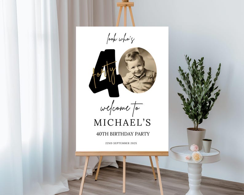 May include: A black and gold welcome sign for a 40th birthday party. The sign says "Look who's forty!" and has a photo of a young boy. The sign also says "Welcome to Michael's 40th Birthday Party" and "22nd September 202X".