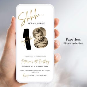 May include: A smartphone displays a digital invitation for an 18th birthday. The design features gold script that reads "Shhh... It's a Surprise" and "Peterson's 18th Birthday." A vintage photo of a child is in the center. The invitation is labeled "Paperless Phone Invitation."